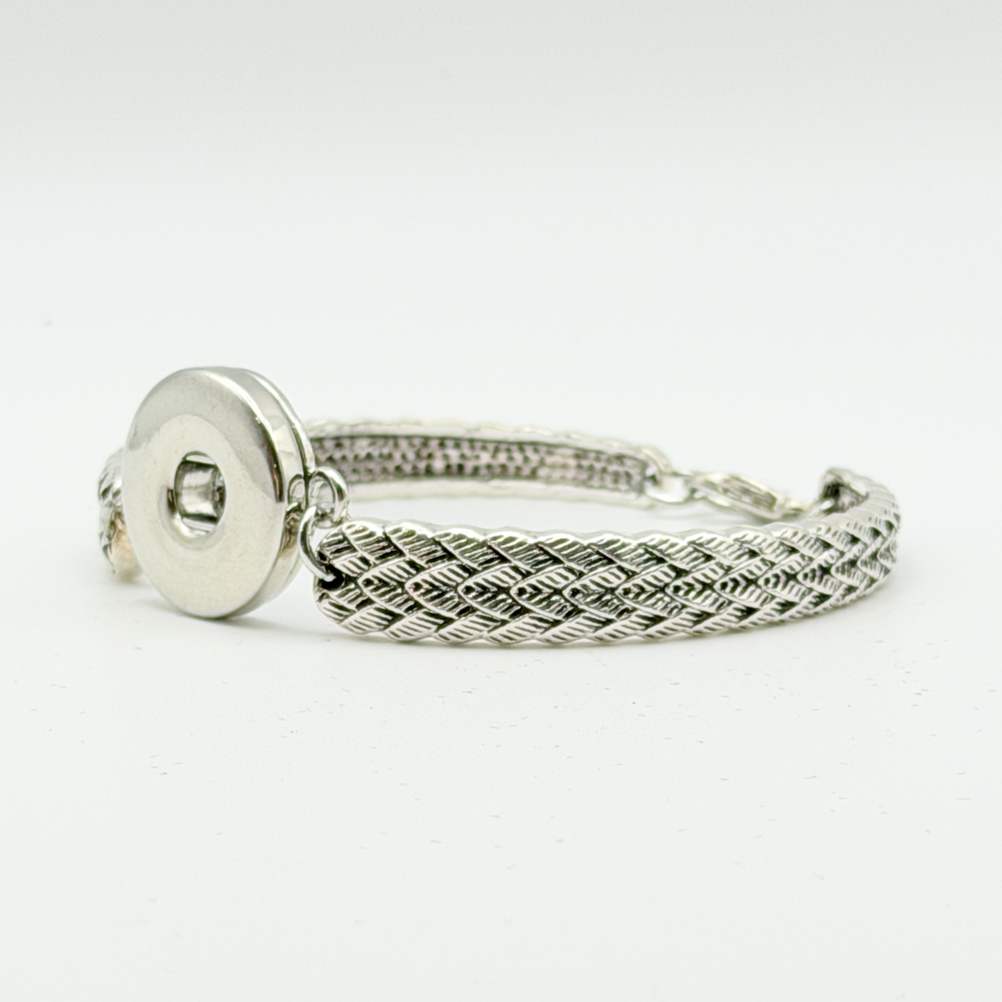 Silver Tone Braided Snap Bracelet